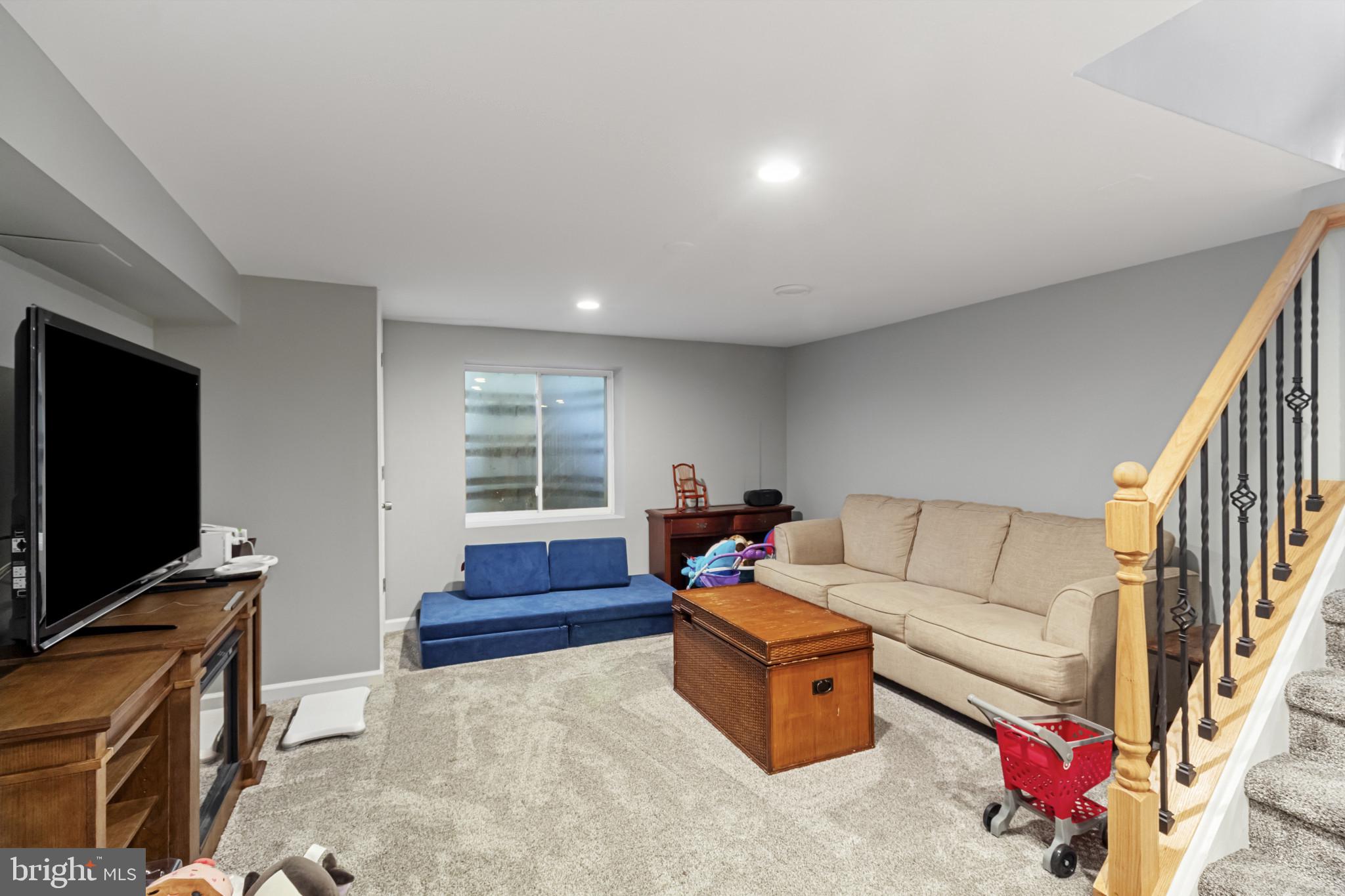 62 John Dyer Way Doylestown, PA 18902 - Photo 33 of 37 a living room with furniture and a flat screen tv