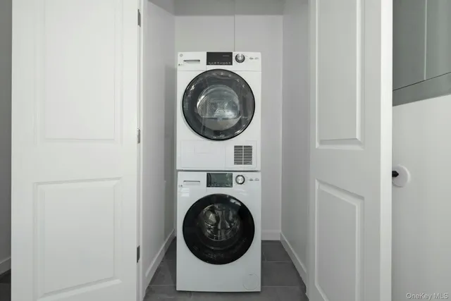 a view of washer and dryer in a utility room