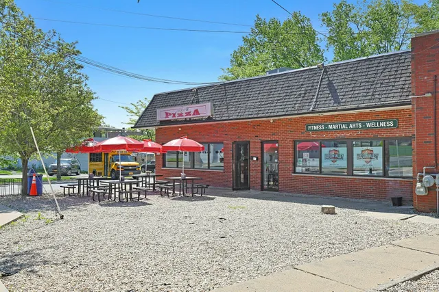 a front view of a building with street view
