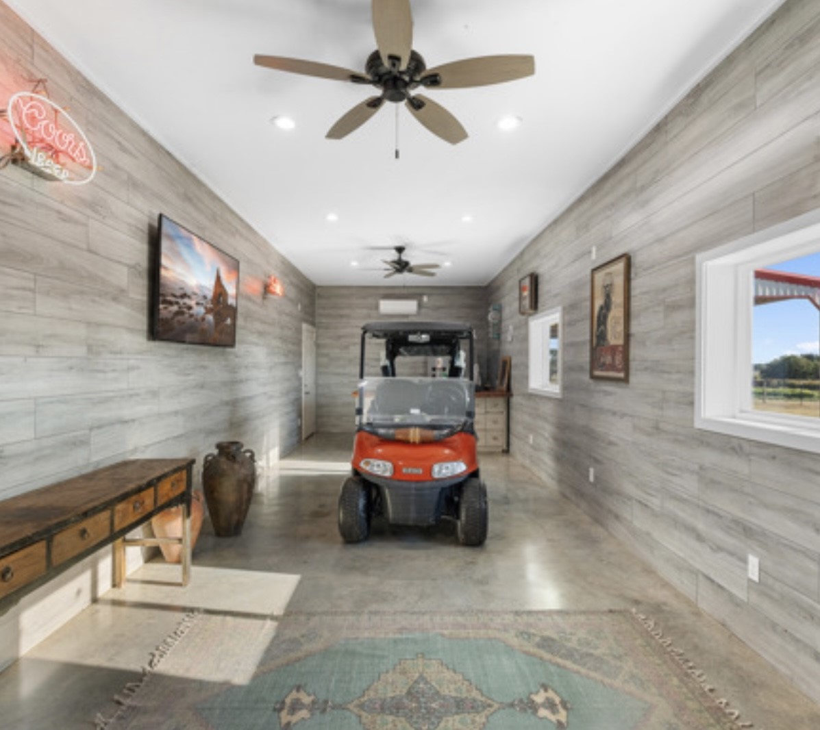 7210 Goehring Road Ledbetter, TX 78946 - Photo 24 of 47 a car parked in a hall with window