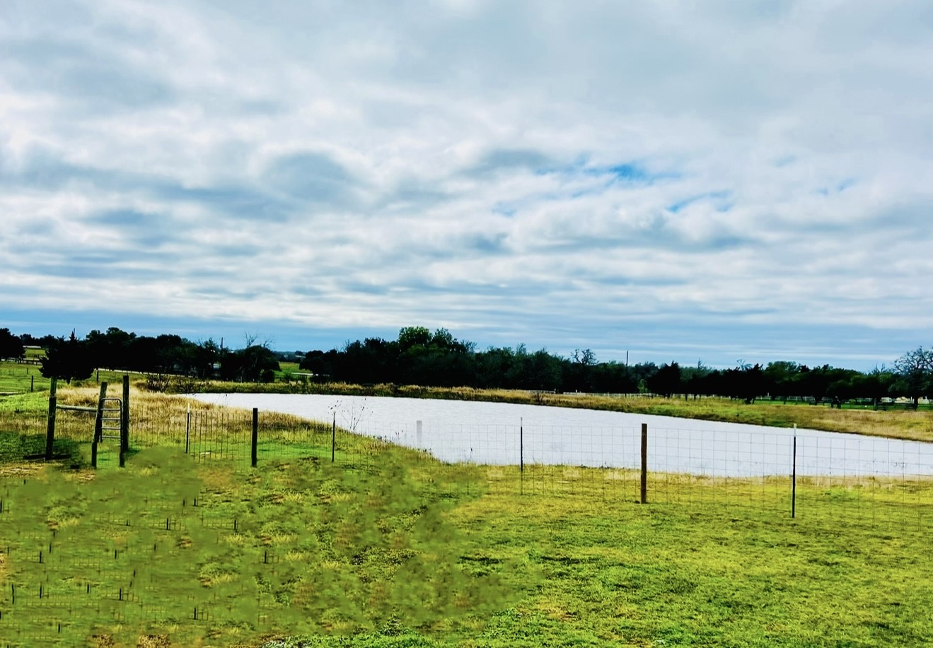 7210 Goehring Road Ledbetter, TX 78946 - Photo 31 of 47 a view of an outdoor space and swimming pool