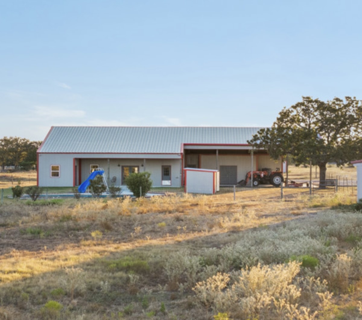 7210 Goehring Road Ledbetter, TX 78946 - Photo 36 of 47 a view of a house with a yard