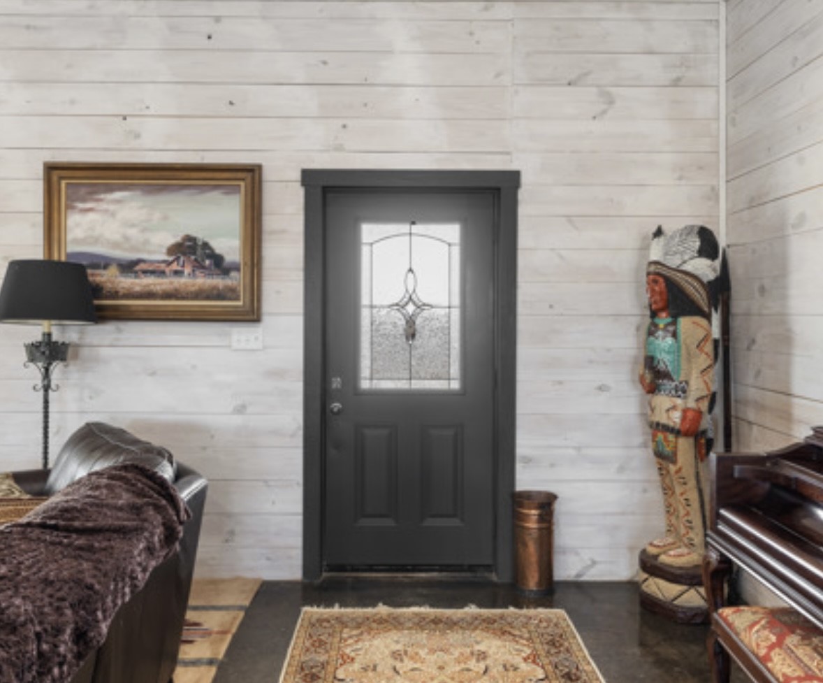 7210 Goehring Road Ledbetter, TX 78946 - Photo 6 of 47 a bedroom with a bed and a couch