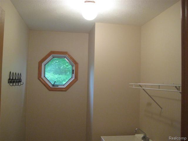 9874 Bergin Road Howell, MI 48843 - Photo 13 of 13 First Floor Laundry Area