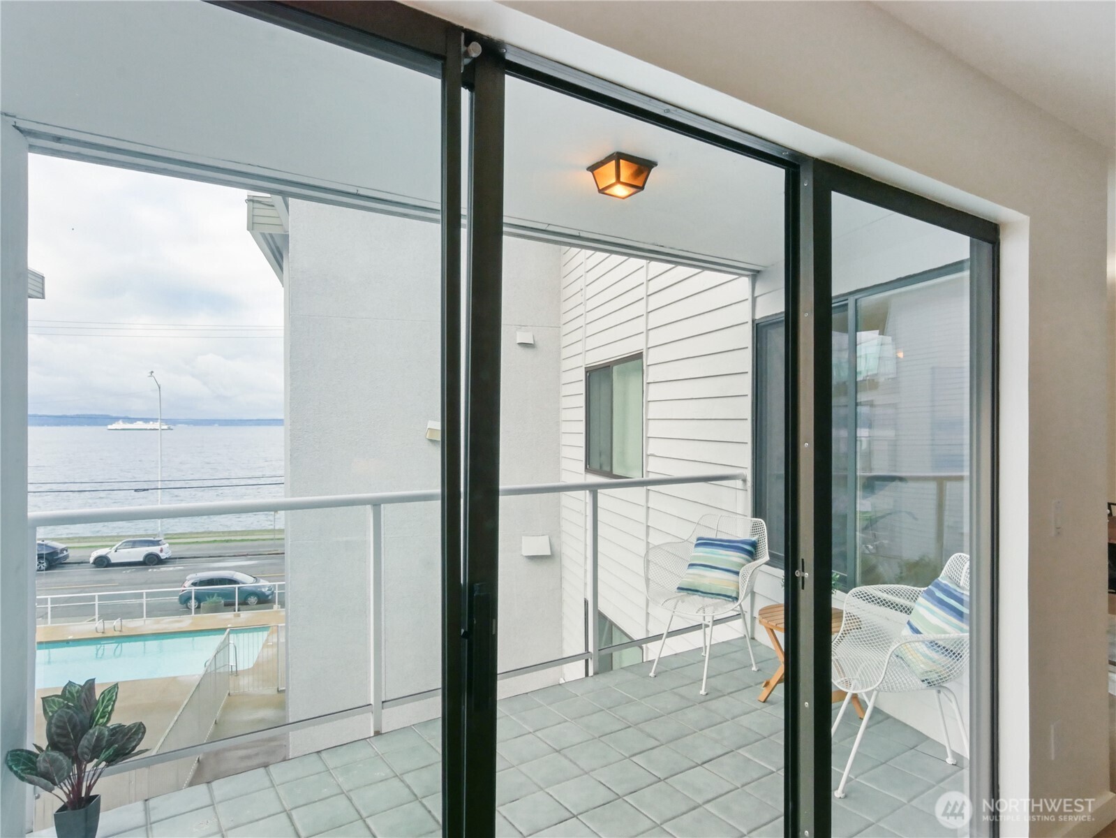 2104 Alki Avenue Southwest, Unit 306 Seattle, WA 98116 - Photo 13 of 40 a view of a bathroom with a shower