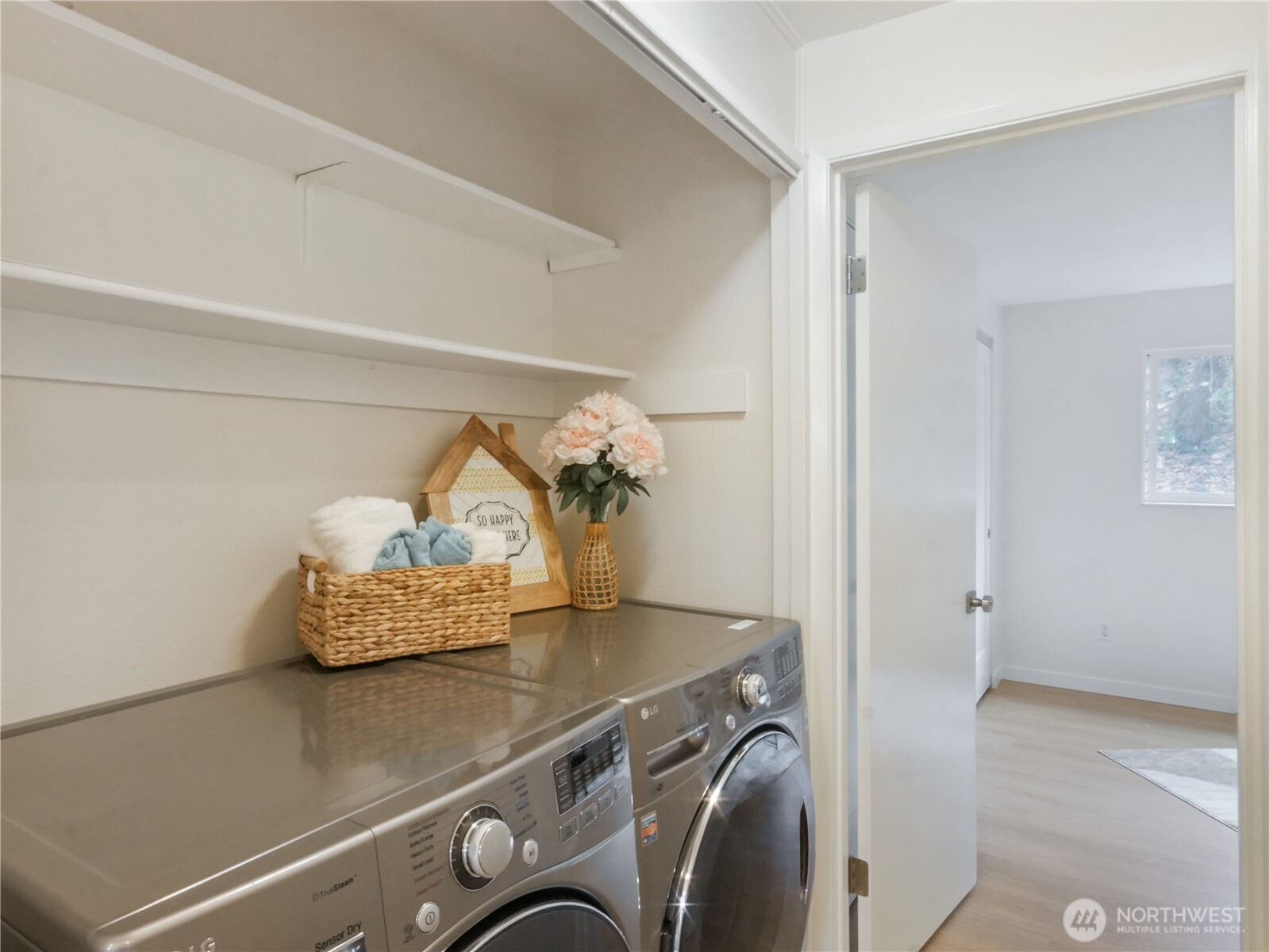 2104 Alki Avenue Southwest, Unit 306 Seattle, WA 98116 - Photo 30 of 40 a utility room with dryer and washer