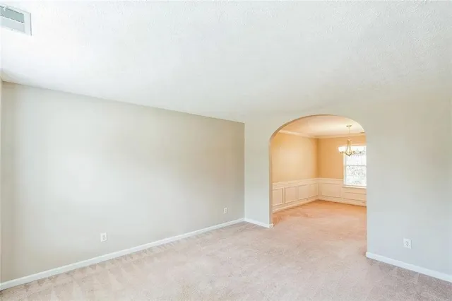 a view of a room with a staircase
