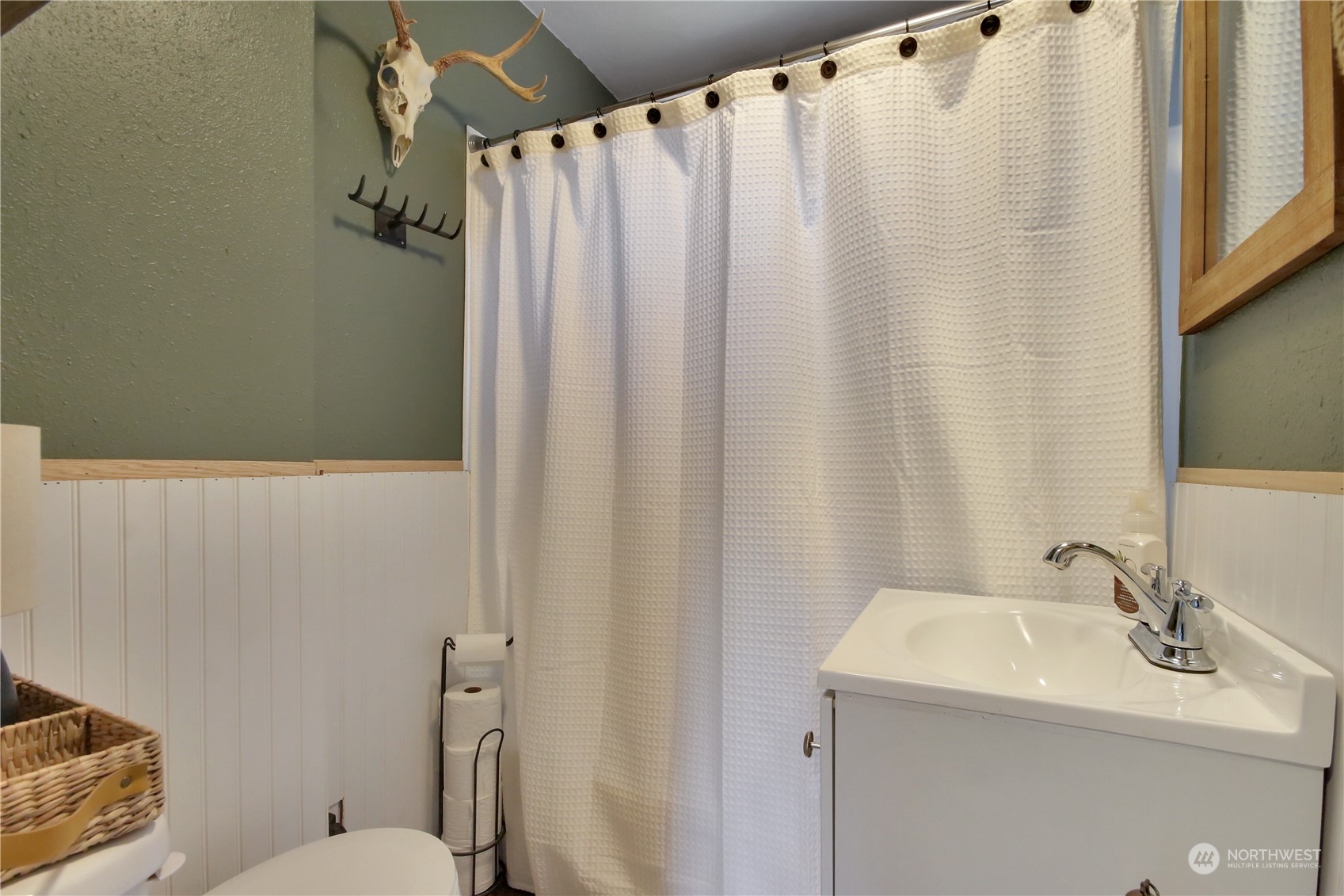 263 Perkins Street Buckley, WA 98321 - Photo 14 of 21 a bathroom with a sink and toilet