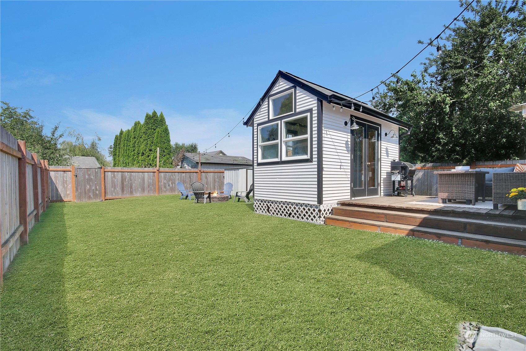 263 Perkins Street Buckley, WA 98321 - Photo 17 of 21 a view of a house with backyard and sitting area