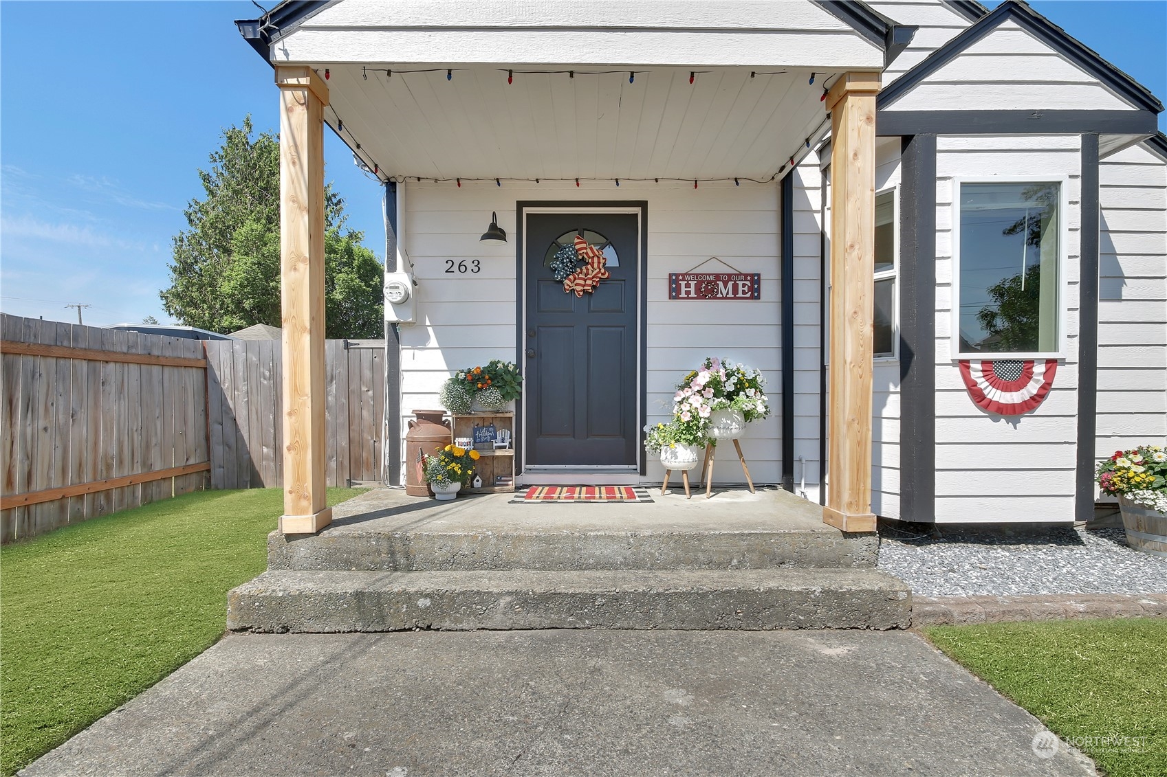 263 Perkins Street Buckley, WA 98321 - Photo 2 of 21 a front view of a house with a porch