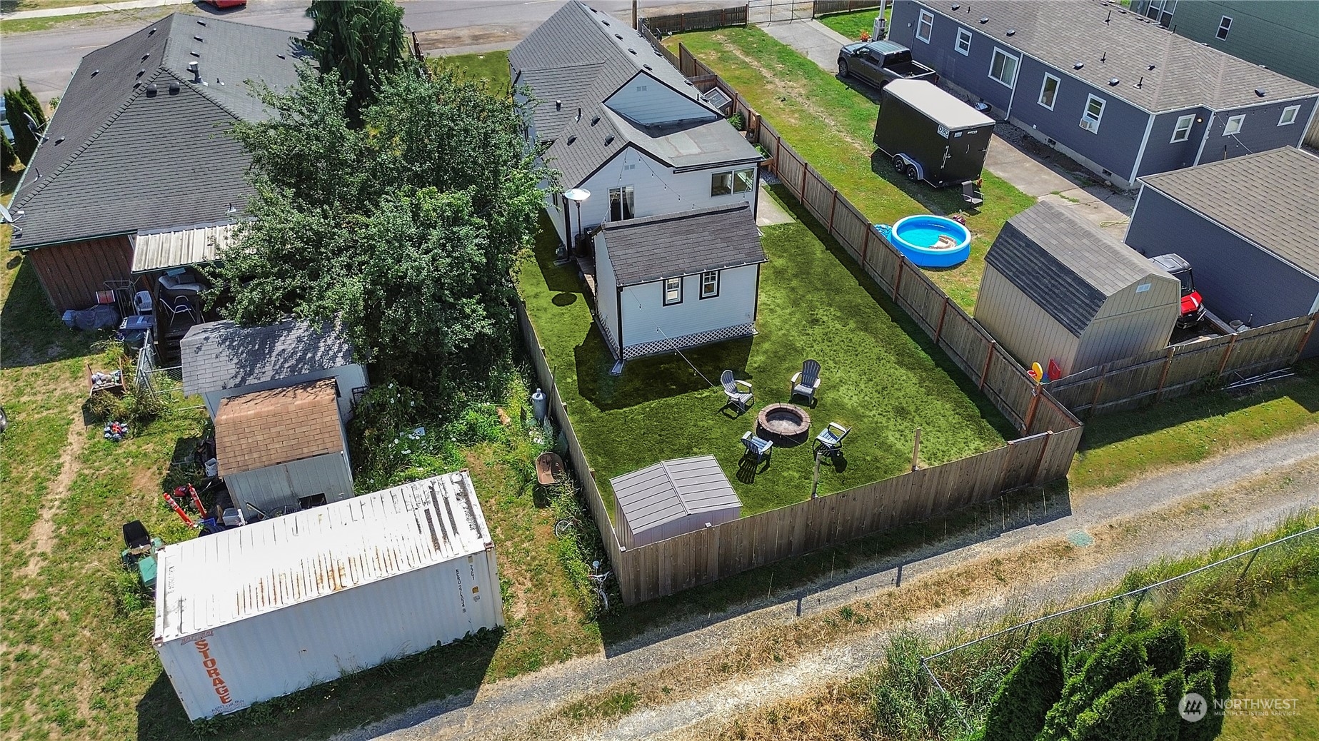 263 Perkins Street Buckley, WA 98321 - Photo 21 of 21 an aerial view of a house with a garden and patio