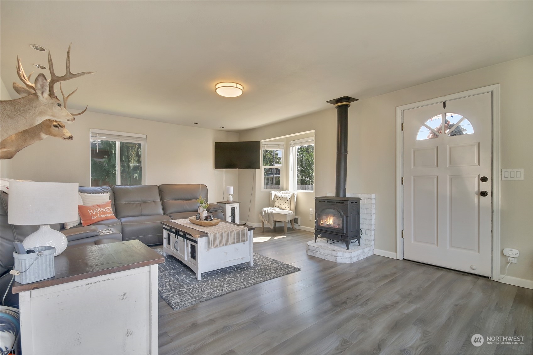 263 Perkins Street Buckley, WA 98321 - Photo 6 of 21 a living room with furniture and a wooden floor