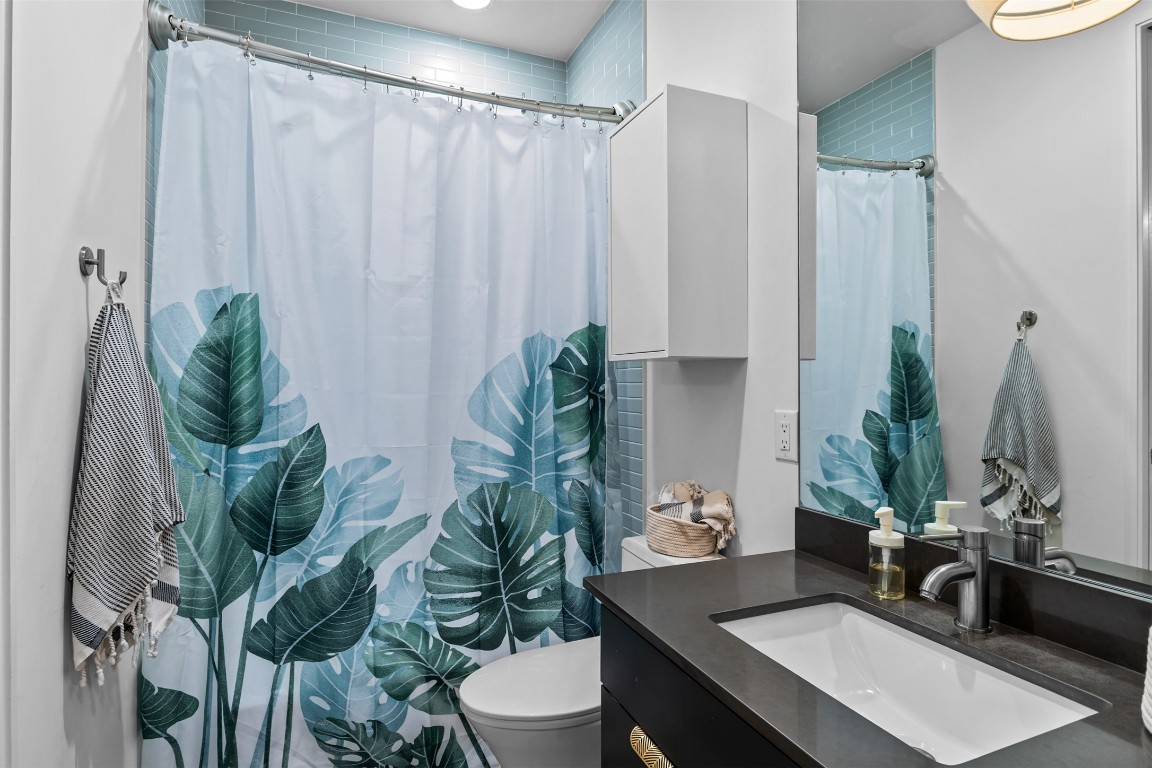 5704 Driftwood Drive Austin, TX 78731 - Photo 17 of 40 a view of a flower pot on a table and a chair