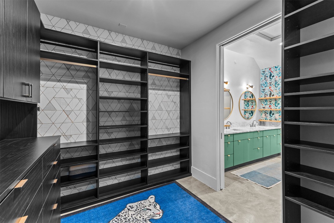 5704 Driftwood Drive Austin, TX 78731 - Photo 23 of 40 a view of walk in closet