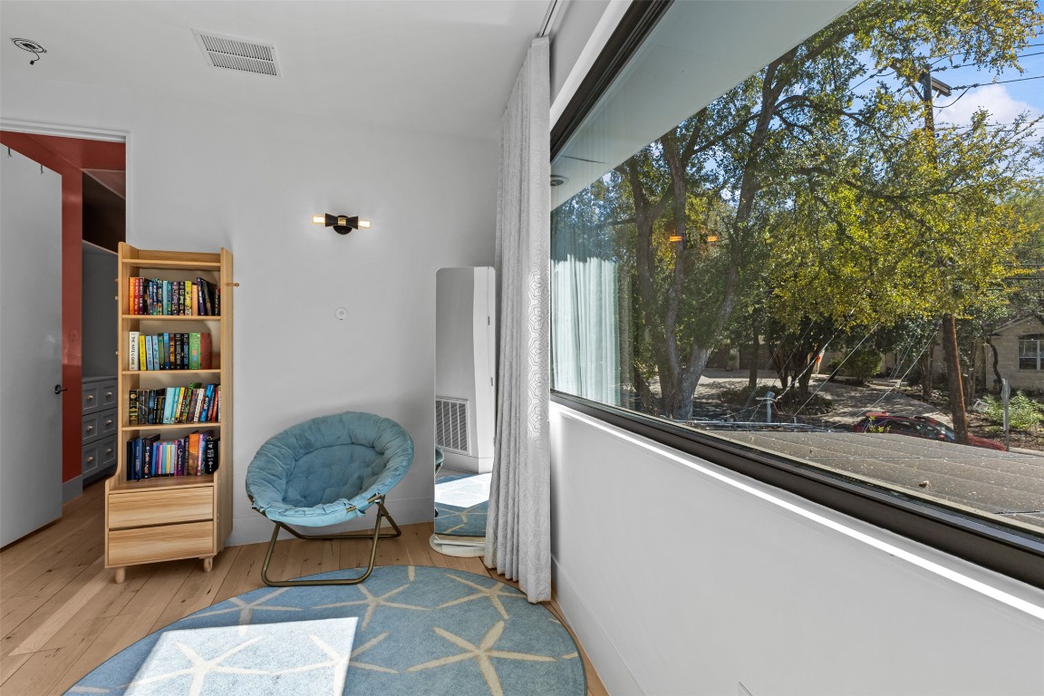 5704 Driftwood Drive Austin, TX 78731 - Photo 26 of 40 a room with furniture and a potted plant