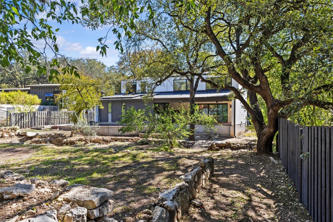 5704 Driftwood Drive Austin, TX 78731 - Photo 35 of 40 a front view of a house with a yard