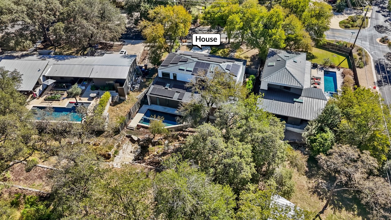 5704 Driftwood Drive Austin, TX 78731 - Photo 37 of 40 an aerial view of multiple houses with yard