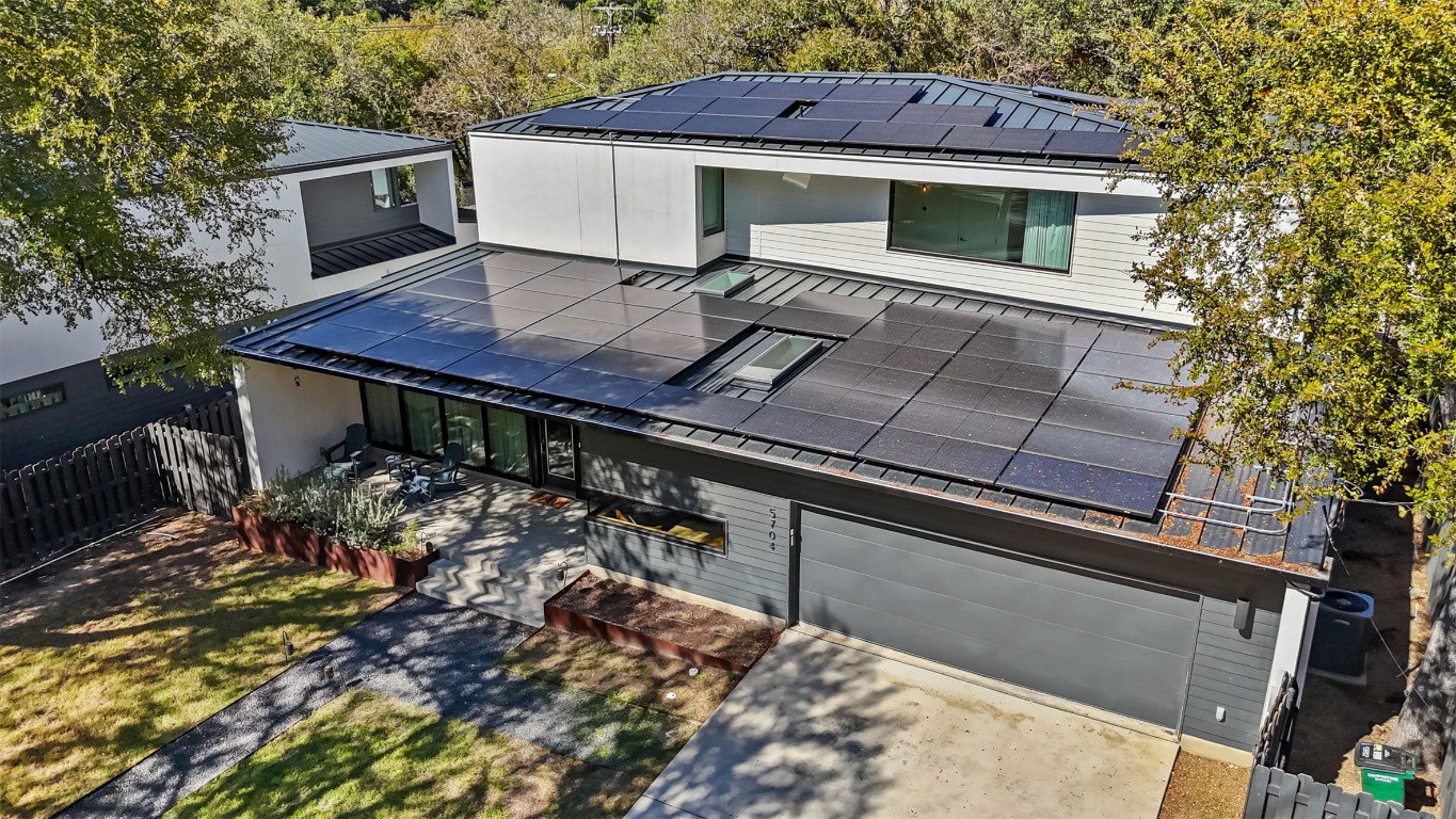 5704 Driftwood Drive Austin, TX 78731 - Photo 38 of 40 a view of a house with a yard and sitting area