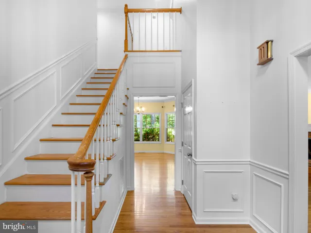 a view of entryway with wooden floor