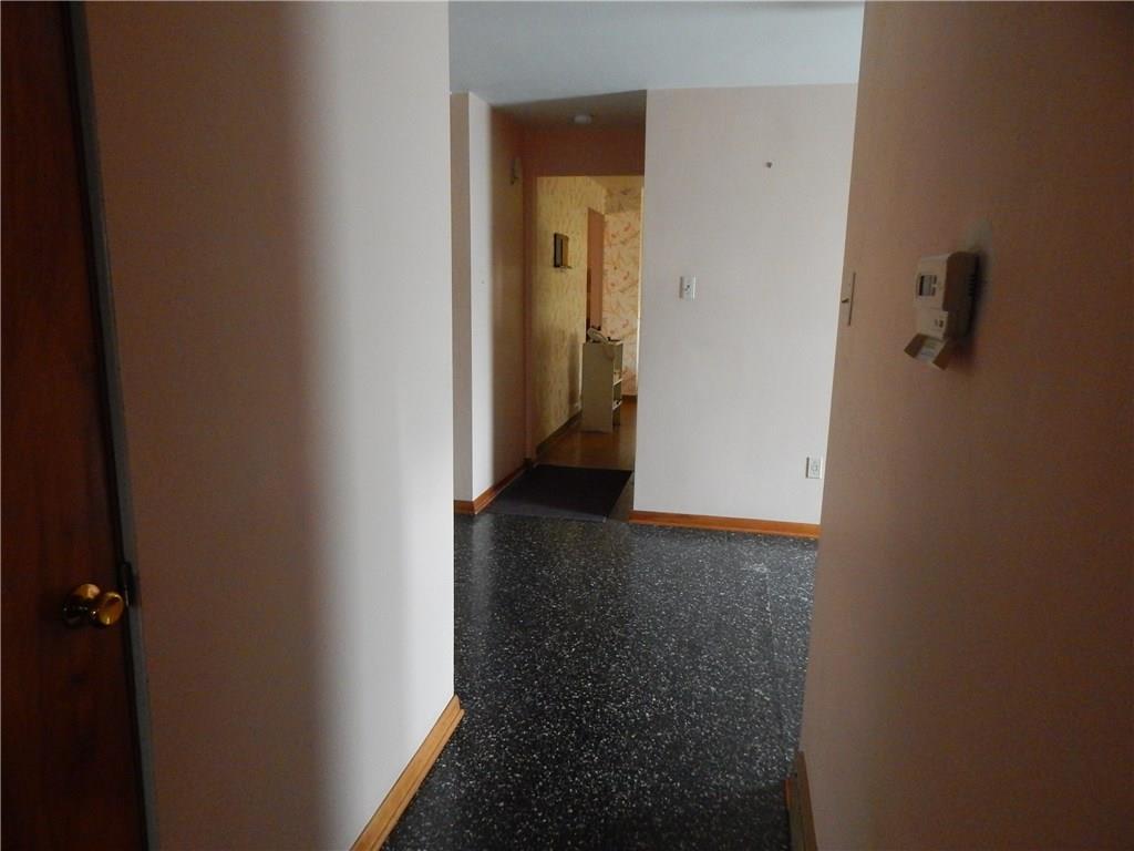 2513 Haymaker Road Monroeville, PA 15146 - Photo 12 of 21 FIRST FLOOR HALLWAY LOOKINGINTO THE FOYER AND KITCHEN.