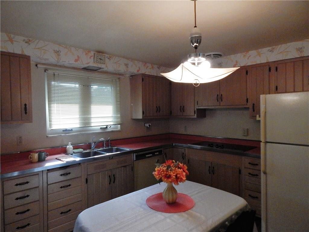 2513 Haymaker Road Monroeville, PA 15146 - Photo 13 of 21 EAT-IN KITCHEN,DOUBLE BOWLSINK, REFRIGERATOR,AND NEWER 5BURNER ELECTRIC COOKTOP.