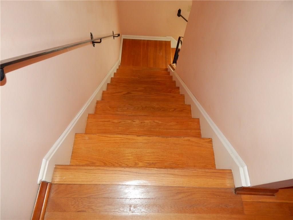 2513 Haymaker Road Monroeville, PA 15146 - Photo 17 of 21 LOVELY HARDWOOD STEPS FROMSECOND LEVEL TO FIRST FLOOR.