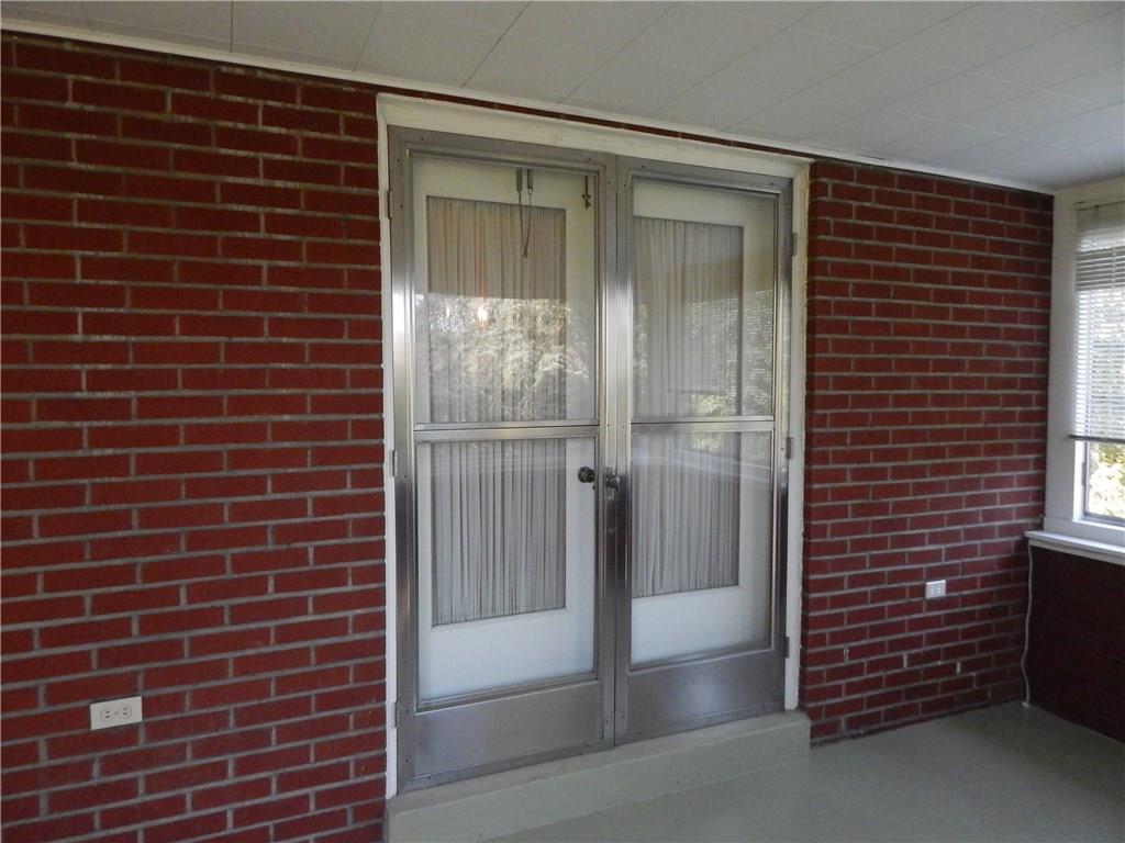 2513 Haymaker Road Monroeville, PA 15146 - Photo 6 of 21 FRENCH DOOR FROM LIVING ROOMTO THE ENCLOSED PORCH.