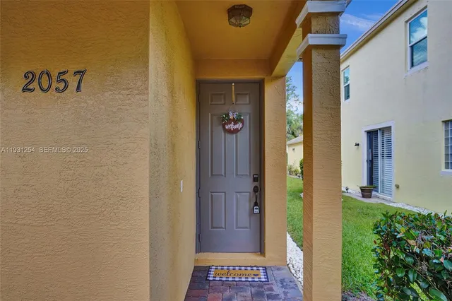 a bathroom with a window and a shower