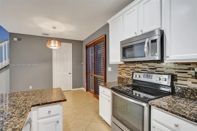 a view of a livingroom with a fireplace