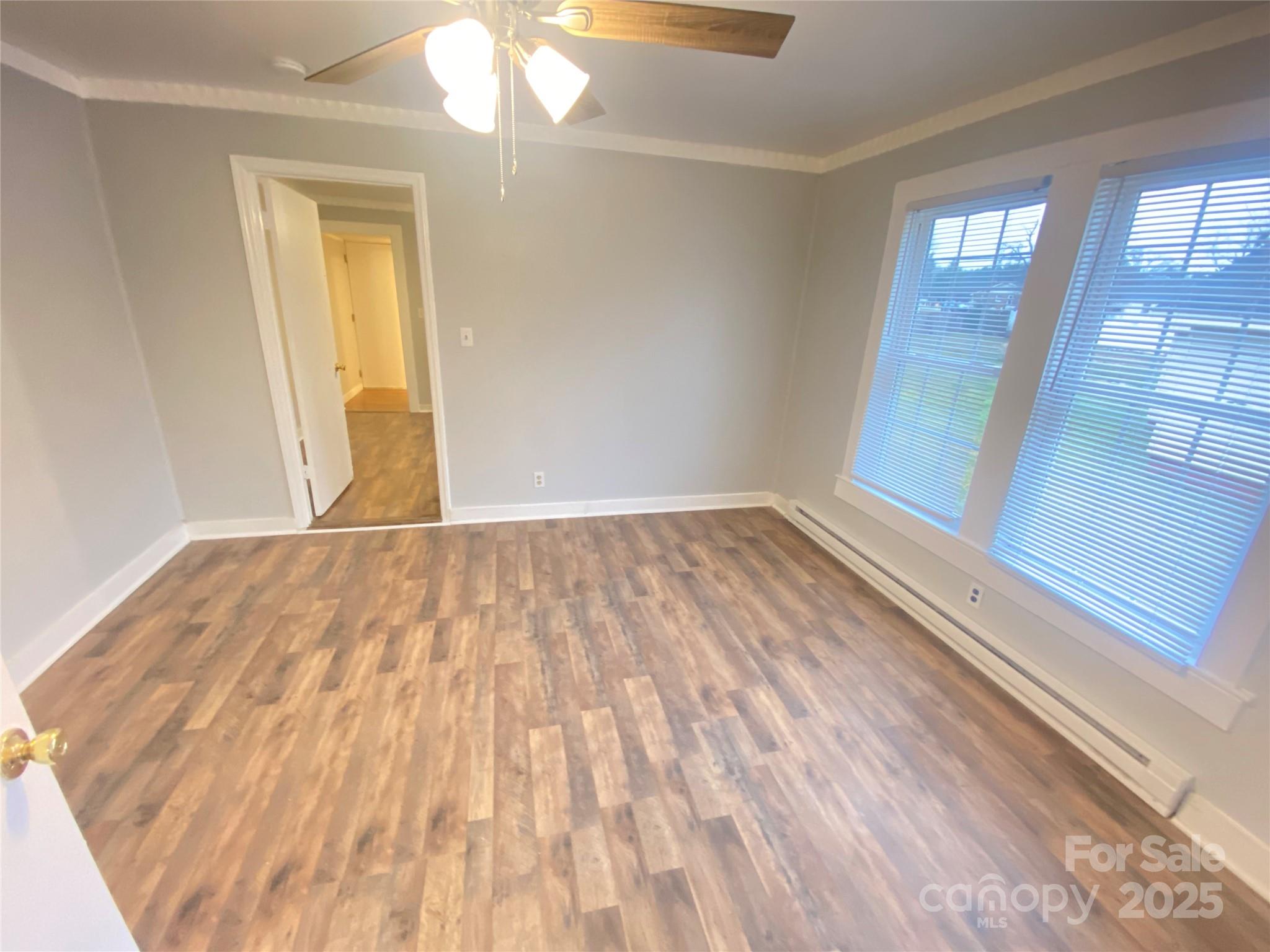 907 Indiana Street Kannapolis, NC 28083 - Photo 15 of 19 a view of empty room with wooden floor