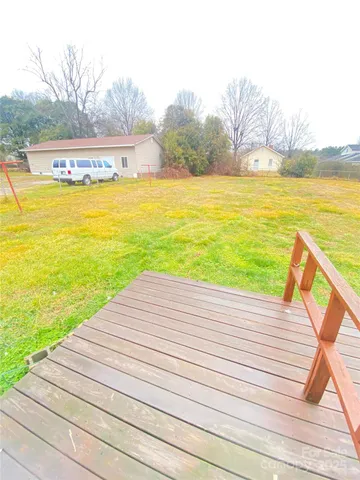 a view of an swimming pool with outdoor seating
