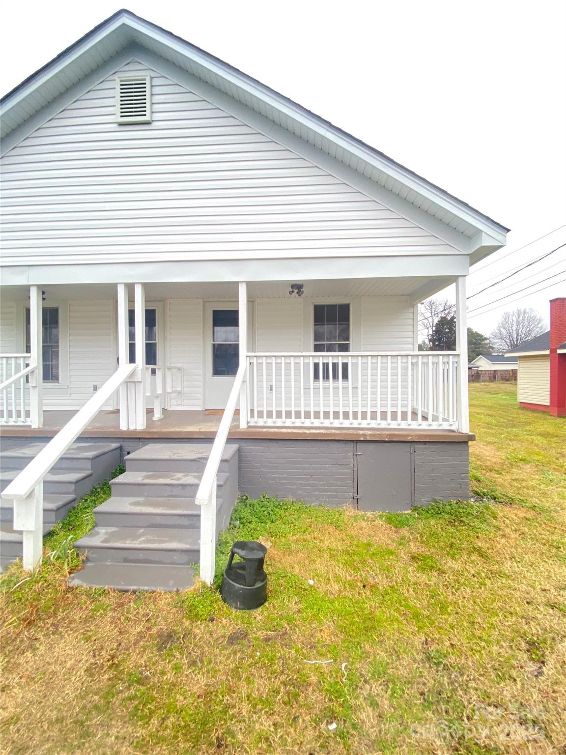 907 Indiana Street Kannapolis, NC 28083 - Photo 10 of 19 a front view of a house with swimming pool