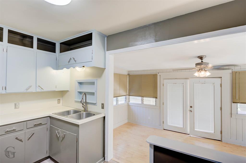 242 Pecan View Drive Minden, LA 71055 - Photo 7 of 20 a kitchen with a sink cabinets and window