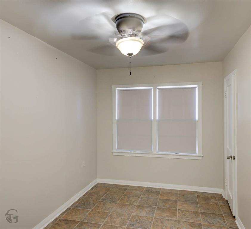 242 Pecan View Drive Minden, LA 71055 - Photo 10 of 20 a view of an empty room with a window