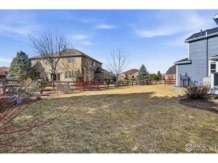 a view of an ocean with a building in the background