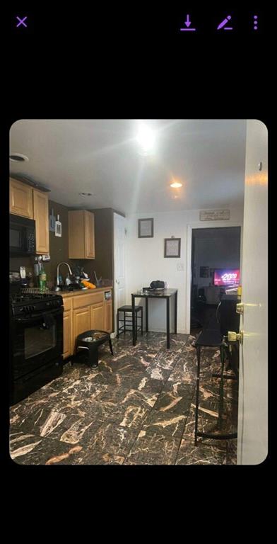 124 Fountain Street Pittsburgh, PA 15212 - Photo 4 of 8 a living room with fireplace furniture and a flat screen tv