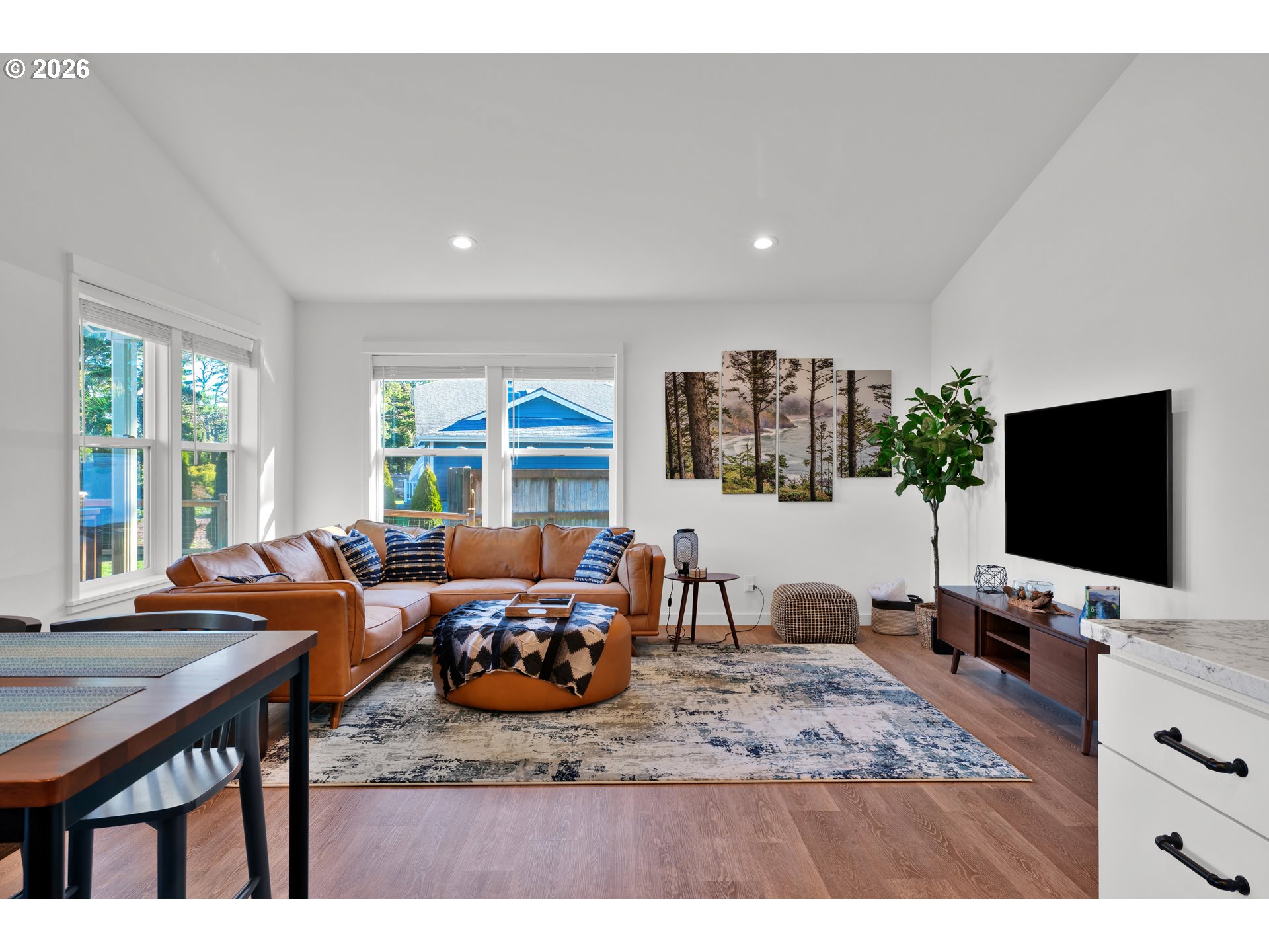 87620 Parkside Drive Florence, OR 97439 - Photo 17 of 35 a living room with furniture and a flat screen tv