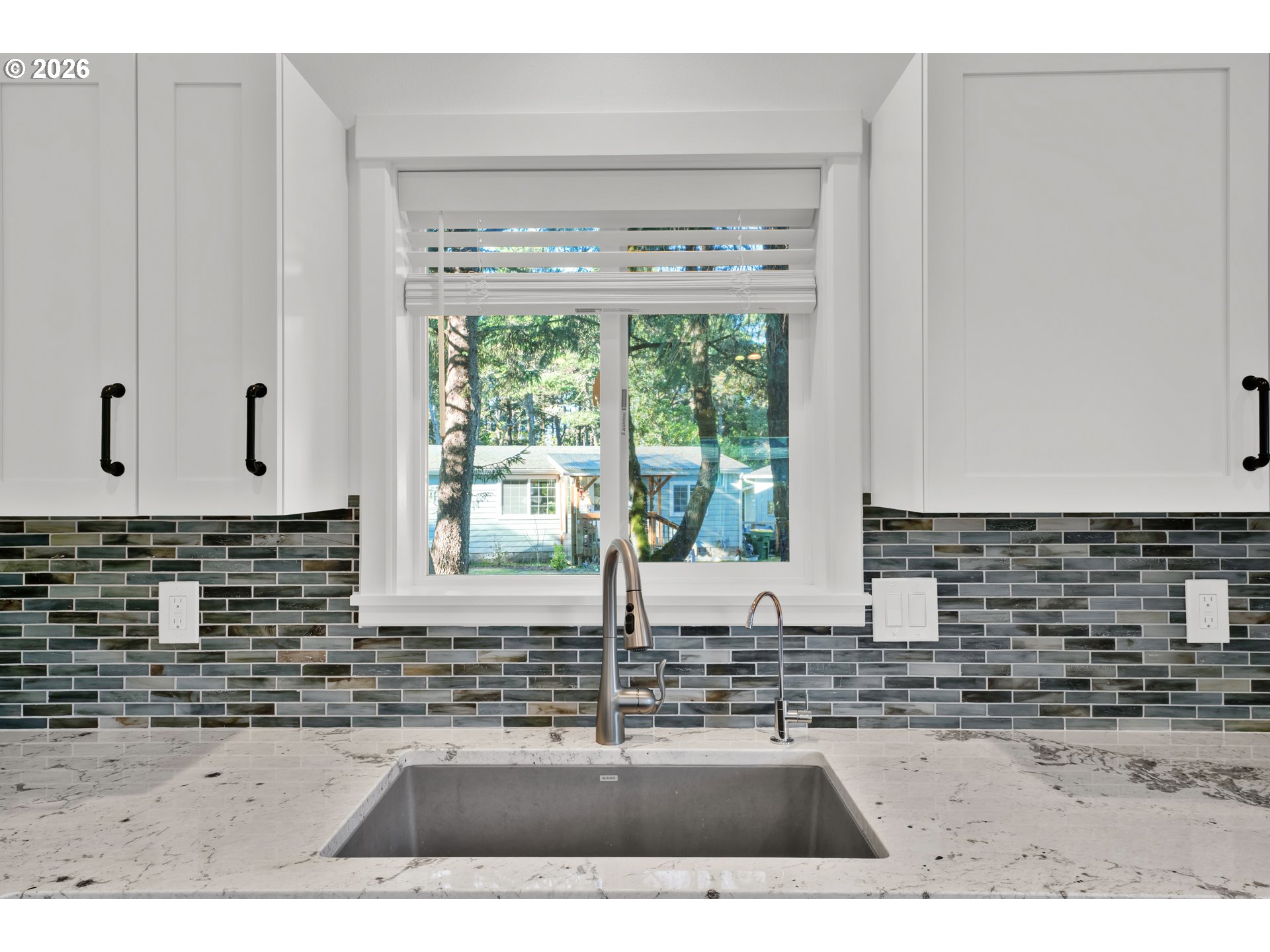 87620 Parkside Drive Florence, OR 97439 - Photo 18 of 35 a view of a kitchen with a sink and a window