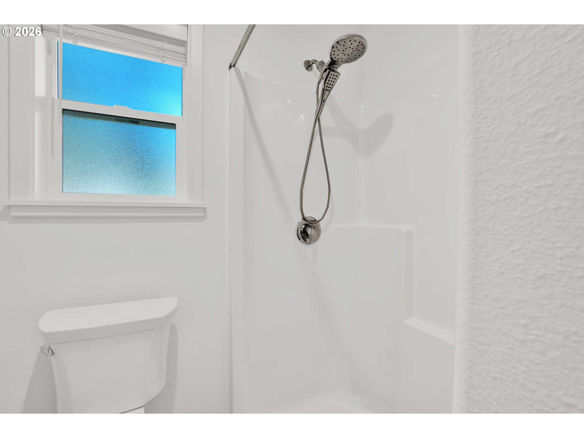 87620 Parkside Drive Florence, OR 97439 - Photo 23 of 35 a bathroom with a shower a toilet and a sink
