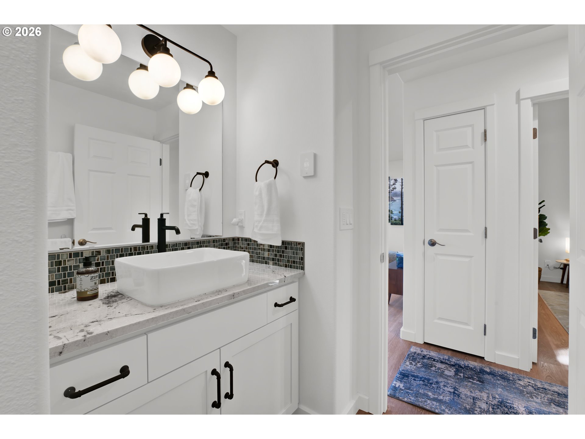 87620 Parkside Drive Florence, OR 97439 - Photo 24 of 35 a bathroom with a sink vanity and a mirror