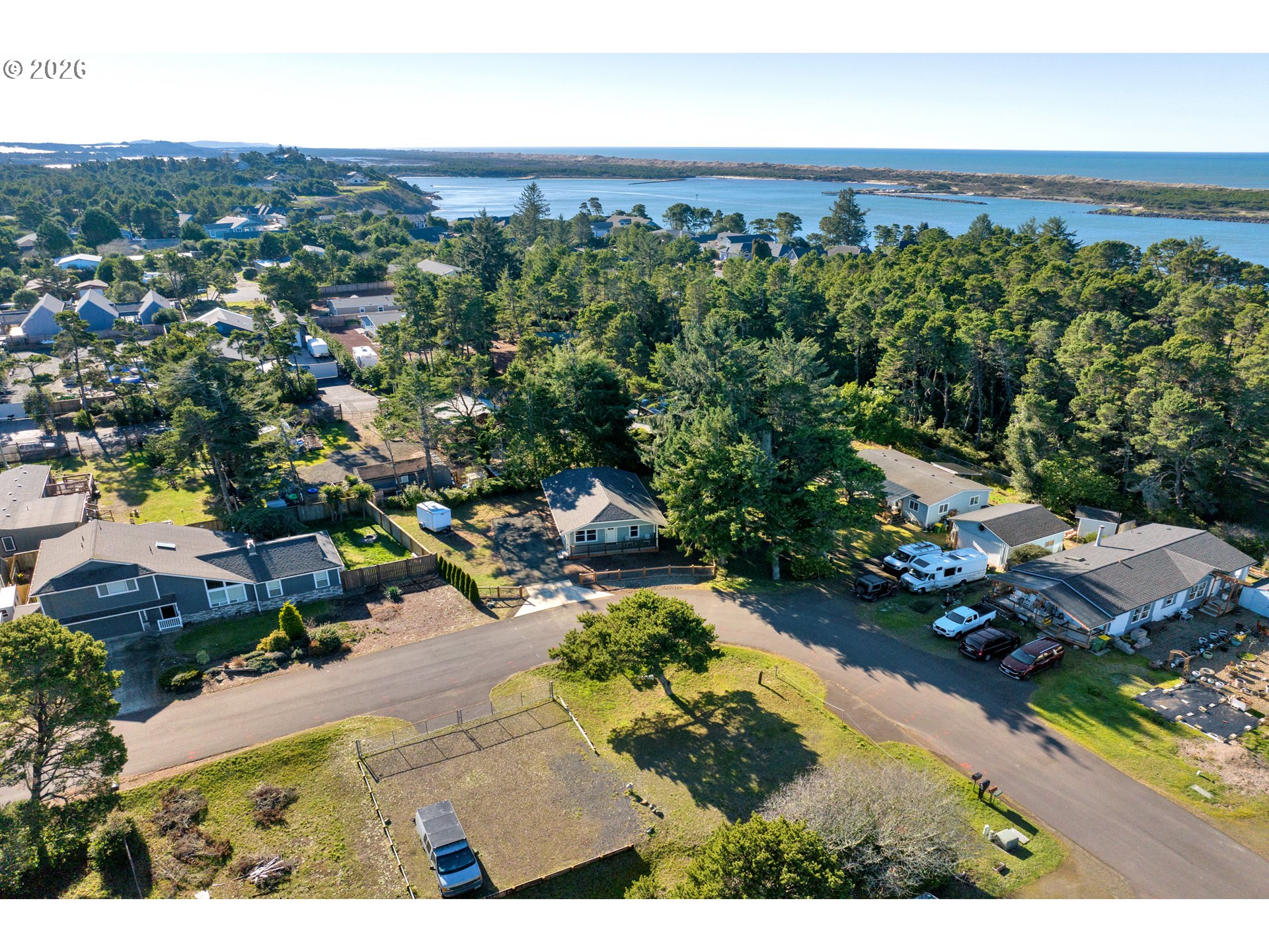 87620 Parkside Drive Florence, OR 97439 - Photo 30 of 35 an aerial view of a house with a yard