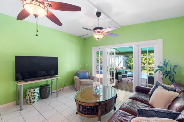 a bathroom with a sink and mirror with toilet
