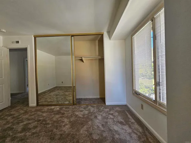 a view of an empty room with window