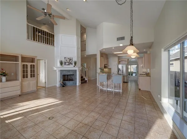 a dining room with furniture and a chandelier