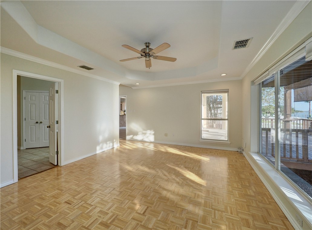 1343 Bayview Drive Portland, TX 78374 - Photo 23 of 36 a view of a livingroom with a chandelier fan and windows