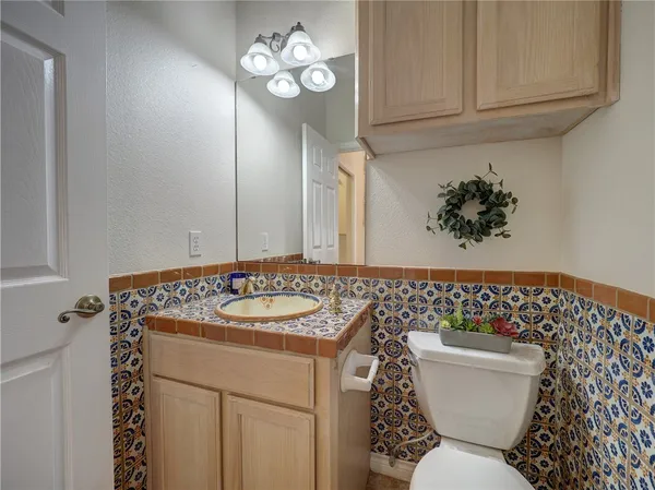a view of cabinets with granite countertop cabinets