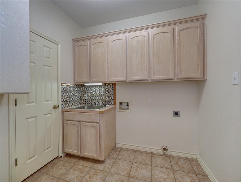 1343 Bayview Drive Portland, TX 78374 - Photo 36 of 36 a view of cabinets with granite countertop cabinets