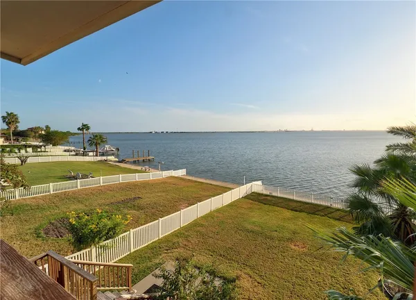 a view of a swimming pool and an ocean