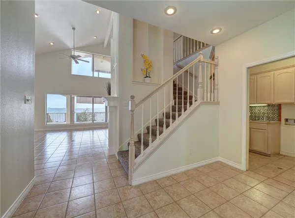 a view of entryway and hall with a window