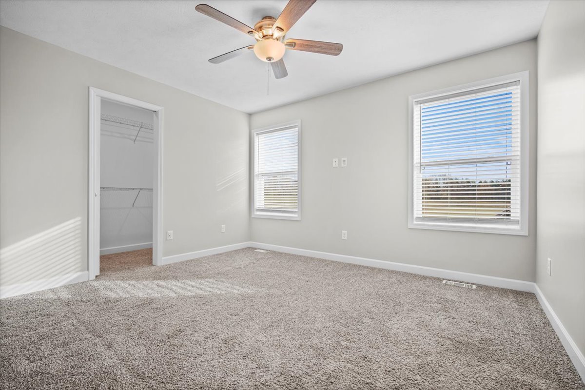 52 Winding Way Bloomington, IL 61705 - Photo 26 of 51 a view of an empty room with a window